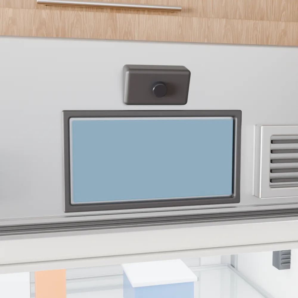 Close-up of the electronics head unit with camera, screen, and speaker grille